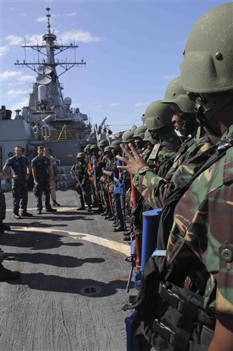 Sailors from the guided-missile destroyer USS Gonzalez (DDG 66) train alongside members of the Tanzania People's Defense Force navy's and boarding teams during a training event aboard Gonzalez as part of a military-to-military bilateral training event where the two navies exchanged best practices and exercised techniques of maritime interdiction. The joint training was conducted to enhance the Tanzanian navy's proficiencies in
boarding vessels and strengthen regional maritime security while also serving to build on the cooperative ties between U.S. and Tanzanian maritime forces. Gonzalez, homeported in Norfolk, Va., is on a scheduled deployment supporting maritime security operations and theater security cooperation efforts in the U.S. Naval Forces Europe-Africa area of responsibility.