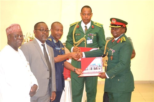 WADPI Graduates: Senior officials from Liberia and Nigeria attend graduation ceremony of the 7th West African Disaster Preparedness Initiative. L-R: Director General of the Nigerian Centre for Disease Control, Dr. Abdulsalam Nasidi; Deputy Speaker of the House of Representatives, Hon. Hans Barchue; Deputy Commandant of KAIPTC, Air Commodore Julius Dzamefe; and WADPI Course Director, Colonel Kennedy Osemwegie present certificates to a Nigerian and Liberian graduates at the Kofi Annan International Peacekeeping Training Centre (KAIPTC) in Accra, Ghana, Sept. 18, 2015.  Funded by U.S. AFRICOM and executed by KAIPTC, the National Disaster  Management Organization (NADMO) of Ghana, and the Economic Community of West African States (ECOWAS), WADPI aims to strengthen national capacities in disaster preparedness, response and management among 17 African Partner Nations, primarily ECOWAS member states, and Mauritania, Chad and Cameroon. (Photo by the KAIPTC-WADPI Communications Team/Released)