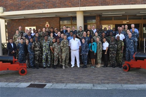 Participants of the final planning event for Exercise Cutlass Express 2015 pose for a group photo. Cutlass Express is a U.S. Africa Command-sponsored multinational maritime exercise designed to increase maritime safety and security in the waters off East Africa. (U.S. Navy photo by Lieutenant Cheryl A. Collins/Released)