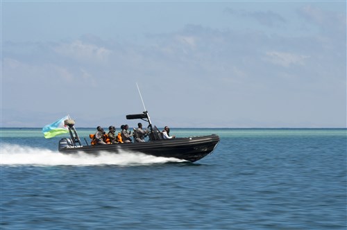 The Djibouti navy and coast guard boarding vessel returns to port after completing the Visit, Board, Search and Seizure exercise scenario during Exercise Cutlass Express 2015 in Djibouti, Feb. 2, 2015. Sponsored by U.S. Africa Command, Exercise Cutlass Express 2015 is designed to improve regional cooperation, maritime domain awareness and information sharing practices to increase capabilities of East African and Indian Ocean nations to counter sea-based illicit activity. (U.S. Air Force photo by Staff Sgt. Carlin Leslie/Released)