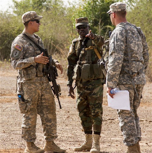 Soldiers from Ghana practice individual squad movements with U.S. Army Soldiers from Co. Attack 1st Bn., 28th Inf. Regt., 4th IBCT, 1st Inf. Div. during Exercise Western Accord 14, June 17. Exercise Western Accord is a partnership exercise between the United States and ECOWAS, which is designed to increase interoperability between military forces and ensure the common ability to conduct peace operations throughout Western Africa.