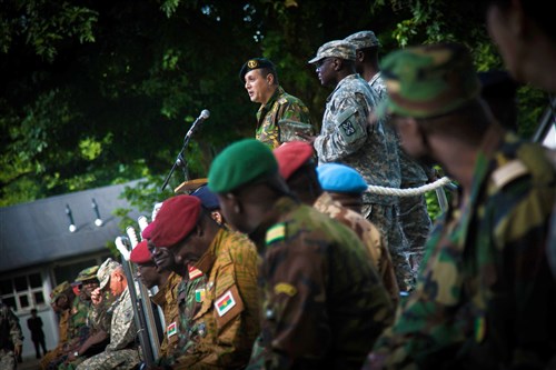 Dutch Brig. Gen. Gino van der Voet, director of training and operations, Royal Netherlands Army Command, addresses a formation of U.S., African and European servicemembers during the opening ceremony for Western Accord 2015, at Harkscamp, The Netherlands, July 20. Western Accord 2015 is a command post exercise in the Netherlands July 20-31. Western Accord 15 replicates the Multidimensional Integrated Stabilization Mission in Mali, Sector Headquarters mission command in support of United Nation and African Union mandated peacekeeping operations. (U.S. Army Africa photo by Sgt. Marcus Fichtl)