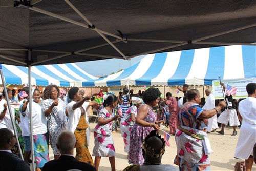 People dance during a ceremony to mark the start of construction on a healthcare facility for women in Amoutivé, Togo, May 26, 2015. U.S. Africa Command funded the project through the Humanitarian and Civic Assistance Program. Photo by Lauren McCaughey, U.S. Embassy Lomé.