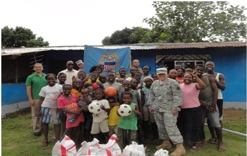 Defense Logistics Agency (DLA) Europe-Africa Commander, COL Deborah Keough, brings toys and supplies to orphanage in Liberia. Deliberate planning and actions across the entire logistics enterprise united the efforts of a multi-disciplined, interagency team formed across nations, governments and non-government organizations (NGOs) which directly led to success in OPERATION United Assistance. U.S. AFRICOM photo/released)