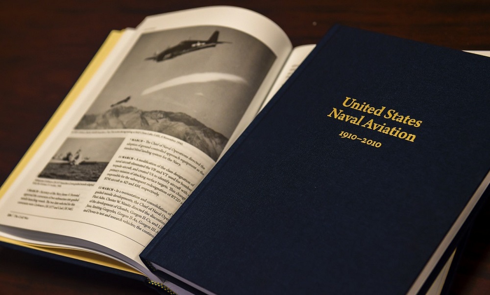 WASHINGTON, D.C. (Aug. 27, 2015) The Navy has released a two-volume history of naval aviation.  "United States Naval Aviation 1910-2010" is the fourth update to the history which was originally initiated in 1960.  It divides the history of U.S. naval aviation into two volumes: chronology and statistics. New and expanded research makes these the definitive volumes on U.S. naval aviation's first century.  These and other free Naval History and Heritage Command publications can be found on the <a href="http://www.history.navy.mil/research/publications/recent-publications.html" alt='Link will open in a new window.' target='whole'>NHHC website</a>. U.S. Navy photo by Mass Communication Specialist 2nd Class Eric Lockwood 

