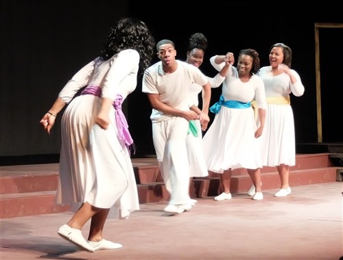 Juba Dance being performed from the play, "Her Stories." “A Century of Black Life, History and Culture” served as the theme for this year’s Black History Month celebration, held at Kelley Barracks, U.S. Army Garrison Stuttgart, Feb. 26, 2015.  Performances by the Patch High School and Stuttgart Gospel Service Choirs and a dance from the play “Her Stories” highlighted the accomplishments of African Americans over the past century. (U.S. Africa Command photos by Brenda Law/Released)  