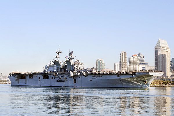 SAN DIEGO (Feb. 25, 2015) The amphibious assault ship USS Makin Island (LHD 8) returns to homeport at Naval Base San Diego following a seven-month deployment to the U.S. 5th and 7th Fleet areas of responsibility as part of the Makin Island Amphibious Ready Group. U.S. Navy photo by Mass Communication Specialist 1st Class Rosalie Chang.