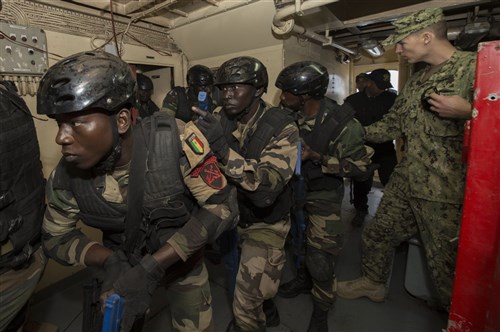 160315-N-ZE250-049 DAKAR, Senegal (March 15, 2016) U.S. Navy and Senegalese navy sailors conduct visit, board, search and seizure training aboard the Senegalese naval vessel PHM Njambuur during Obangame/Saharan Express 2016 (OESE16) in Dakar, Senegal, March 15, 2016. OESE16, one of three African regional express series exercises facilitated by U.S. Naval Forces Europe-Africa/U.S. 6th Fleet, seeks to increase regional cooperation, maritime domain awareness, information sharing practices and improve interoperability among participating forces in order to enhance maritime security and regional economic stability. (U.S. Navy photo by Mass Communication Specialist 3rd Class Weston Jones/Released)