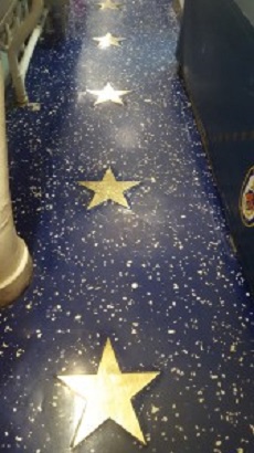 There are 17 gold stars in the deck along the crew’s mess line onboard USS Cole commemorating the Sailors who lost their lives in the Oct. 12, 2000 attack.  U.S. Navy photo 
