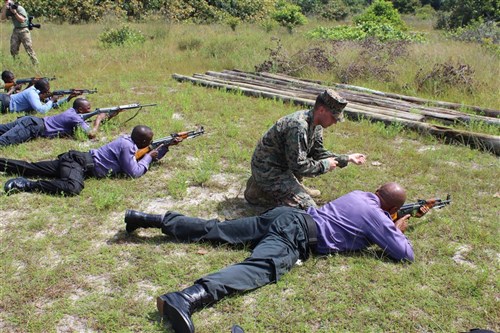 U.S. Marines and U.K. Royal Marine Commandos teach Nigerian  sailors weapons handling skills and marksmanship, Oct. 22, in Sekondi, Ghana. U.S. Marines and U.K. Royal Marine Commandos trained the Nigerian sailors as part of the Africa Partnership Station, which is a U.S. Naval Forces Africa initiative that aims to increase the maritime safety and security capacity of African partners through collaboration and regional cooperation through engagement exercises that build toward self-sustained African security of the maritime domain.  