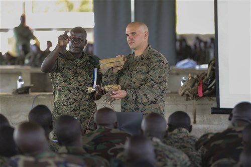 U.S. Marine Staff Sgt. Evan Crowgey, an explosive ordnance disposal technician with Special-Purpose Marine Air-Ground Task Force Crisis Response-Africa, conducted an improvised explosive device awareness class with the Uganda People’s Defense Force at Camp Singo, Uganda, Nov. 2, 2015. Marines and sailors with SPMAGTF-CR-AF are training with the UPDF to increase engineering and logistical capabilities while strengthening the bonds between the partner counties. (U.S. Marine Corps photo by Cpl. Olivia McDonald/Released)