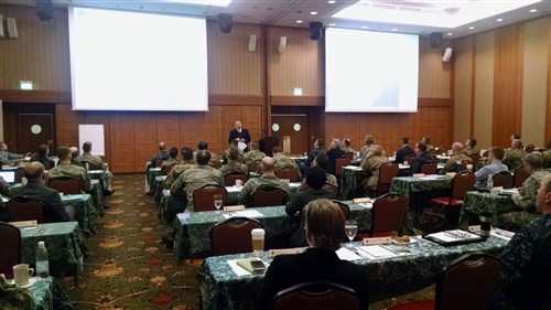 Dave King, AFRICOM Theater Posture J5-98, speaks to engineer workshop participants about the AFRICOM theater posture.