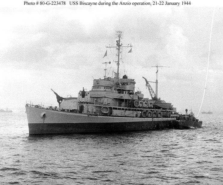 Serving as invasion force flagship for the Anzio landings, 21-22 January 1944. Photographed from USS Frederick C. Davis (DE-136); note the PT boat alongside. Photo courtesy of the U.S. Navy (now in the collections of the National Archives).