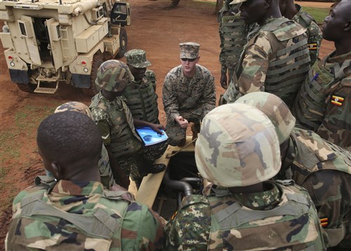 U.S. Marines with Special-Purpose Marine Air-Ground Task Force Crisis Response-Africa, train members of the Uganda People’s Defense Force on Mine-Resistant, Ambushed-Protected Vehicles, or MRAPs, at Camp Singo, Uganda, Nov. 3, 2015. Marines and sailors with SPMAGTF-CR-AF are training with the UPDF to increase engineering and logistical capabilities while strengthening the bonds between the partner countries. (U.S. Marine Corps photo by Cpl. Olivia McDonald/Released)