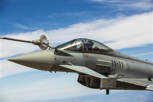 A Eurofighter Typhoon with the Spanish Air Force based out of Morón Air Base, Spain, refuels from a KC-130J Hercules, a first for the Marines from Special-Purpose Marine Air-Ground Task Force Crisis Response-Africa, Aug. 13, in Spain. The U.S. and Spain have been fostering one of the closest defense partnerships around the world for more than 60 years. (U.S. Marine Corps photo by Staff Sgt. Vitaliy Rusavskiy/Released)