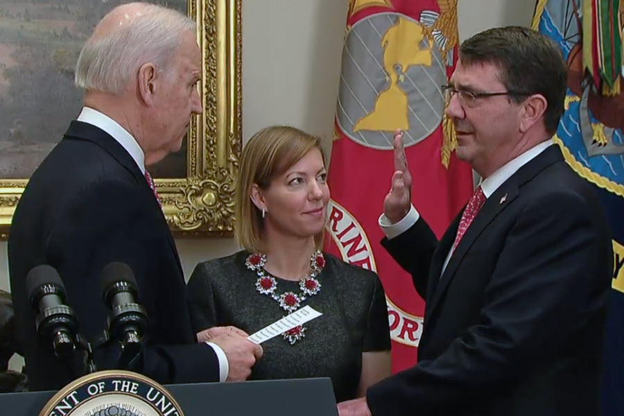 Vice President Joe Biden swears in Ash Carter as the 25th defense secretary as Carter's wife, Stephanie, looks on during a private ceremony at the White House, Feb. 17, 2015. DoD screen shot