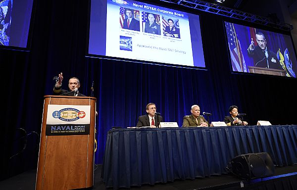 WASHINGTON (Feb. 5, 2015) Chief of Naval Research Rear Adm. Mat Winter, moderates a research, development, test, and evaluation corporate board panel session during the Naval Future Force Science and Technology Expo. Panel members included Sean J. Stackley, Assistant Secretary of the Navy for Research, Development and Acquisition, Gen. John Paxton, Assistant Commandant of the Marine Corps, and Adm. Michelle Howard, Vice Chief of Naval Operations. The expo provides broad access to Office of Naval Research (ONR) research, people, and opportunities. It also helps participants explore new ideas while learning how to work with ONR. U.S. Navy photo by John F. Williams.