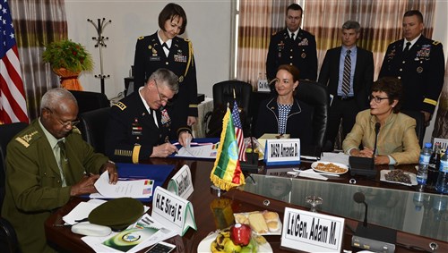 Gen. David Rodriguez, Commander U.S. Africa Command and en. Samora Yunis, Chief of Staff Ethiopian National Defense Force sign the summary of conclusions after a Bilateral Defense Committee (BDC) meeting in Addis Ababa, Ethiopia, March 31, 2016. The new agreement out lines the cross-exchange of logistics, services, supplies and support, as well as a way forward for the Africa Data-Sharing Network and combat engineering. (U.S. Air Force photo by Tech. Sgt. Dan DeCook)