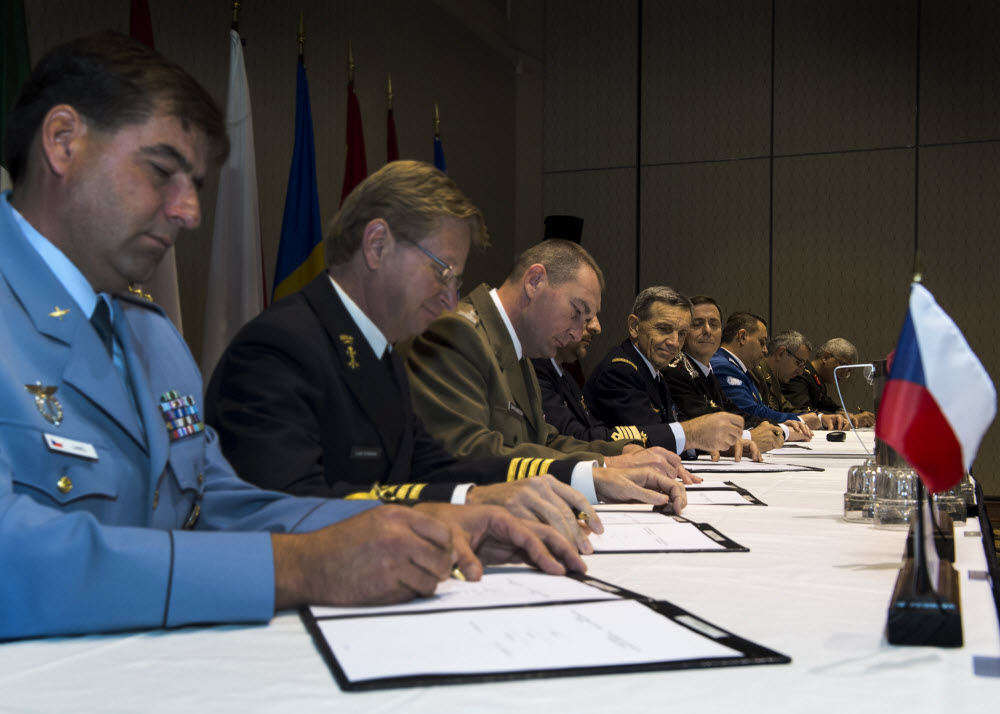 SACT and representatives from the framework nation, Italy and sponsoring nations sign a Memorandum of Understanding establishing the NATO Stability Policing Center of Excellence. Photo by Petty Officer Stephen Oleksiak.