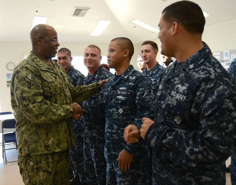 Rear Adm. Young greets Sailors while on a special two-day visit for celebration of Navy Reserve Centennial event in February. U.S. Navy photo.