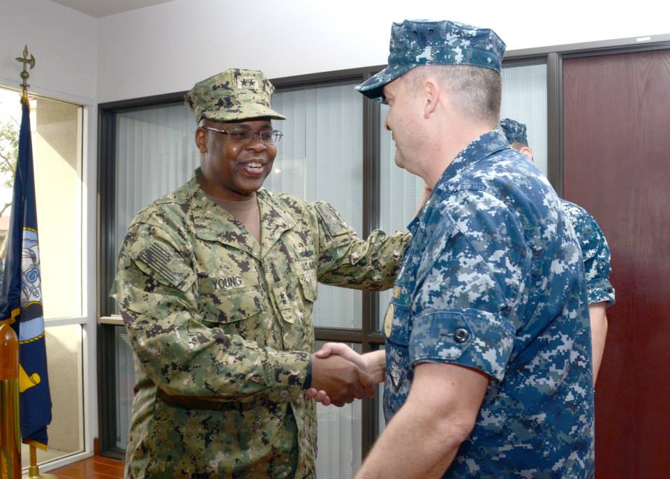 Rear Adm. Eric Young, CNRFC shake hands with CMDCM Tom Lintz, NOSC Ventura County. Young was on a special two-day visit for celebration of Navy Reserve Centennial event in February. Young has said that during his time as commander, Navy Reserve Forces Command, he wants to ensure that the Navy Reserve Force is spending its time on mission success, and not on administrative details. This being the case, he has instructed every one under his command to make customer service their number one priority. U.S. Navy photo.