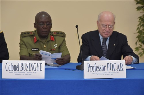 Deputy Chief of Legal Services for the Uganda Peoples’ Defence Forces, Col. Godard Busingye, (left), and President of the International Institute of Humanitarian Law (IIHL), Prof. Fausto Pocar at the U.S. AFRICOM’s Fourth Africa Accountability Colloquium (ACIV) on “Responding to Gender Based Violence During Peace Operations.”  Nearly 40 military legal professional and commanders from 20 African countries have come together in an effort to lay the foundation for responding to sexual violence allegations that occur during peacekeeping operations.  The annual event is once again being hosted by the International Institute of Humanitarian Law (IIHL) in Sanremo, Italy, Mar. 1-3, 2016.  (U.S. Africa Command photo by Brenda Law/RELEASED)