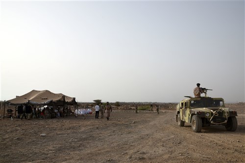 CAMP CHEIK OSMAN, Djibouti – Djiboutian Armed Forces(FAD) Soldiers demonstrate the collective skills they learned from a five month area logistics training instructed by U.S. Army Regionally Aligned Forces Soldiers at their training graduation, May 19, 2016, at Camp Cheik Osman, Djibouti. Beginning in January 2016, the FAD Soldiers learned basic logistics functions, supply, economy, warehouse operations, maintenance along with rifle marksmanship, convoy operations and heavy weapons. (U.S. Air Force photo by Staff Sgt. Tiffany DeNault/Released)