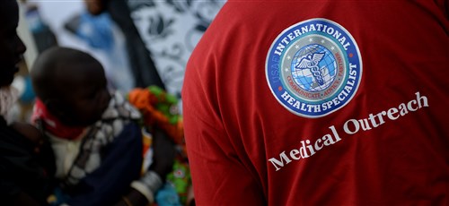 U.S. Air Force Airmen assist patients during a medical outreach event June 22, 2016 at Lokusero, Kenya. The medical outreach was part of the first African Partnership Flight in Kenya. Over the course of three days, medical assistance was provided for more than 1,250 patients. The APF is designed for U.S. and African partner nations to work together in a learning environment to help build expertise and professional knowledge and skills. (U.S. Air Force photo by Tech. Sgt. Evelyn Chavez/Released)