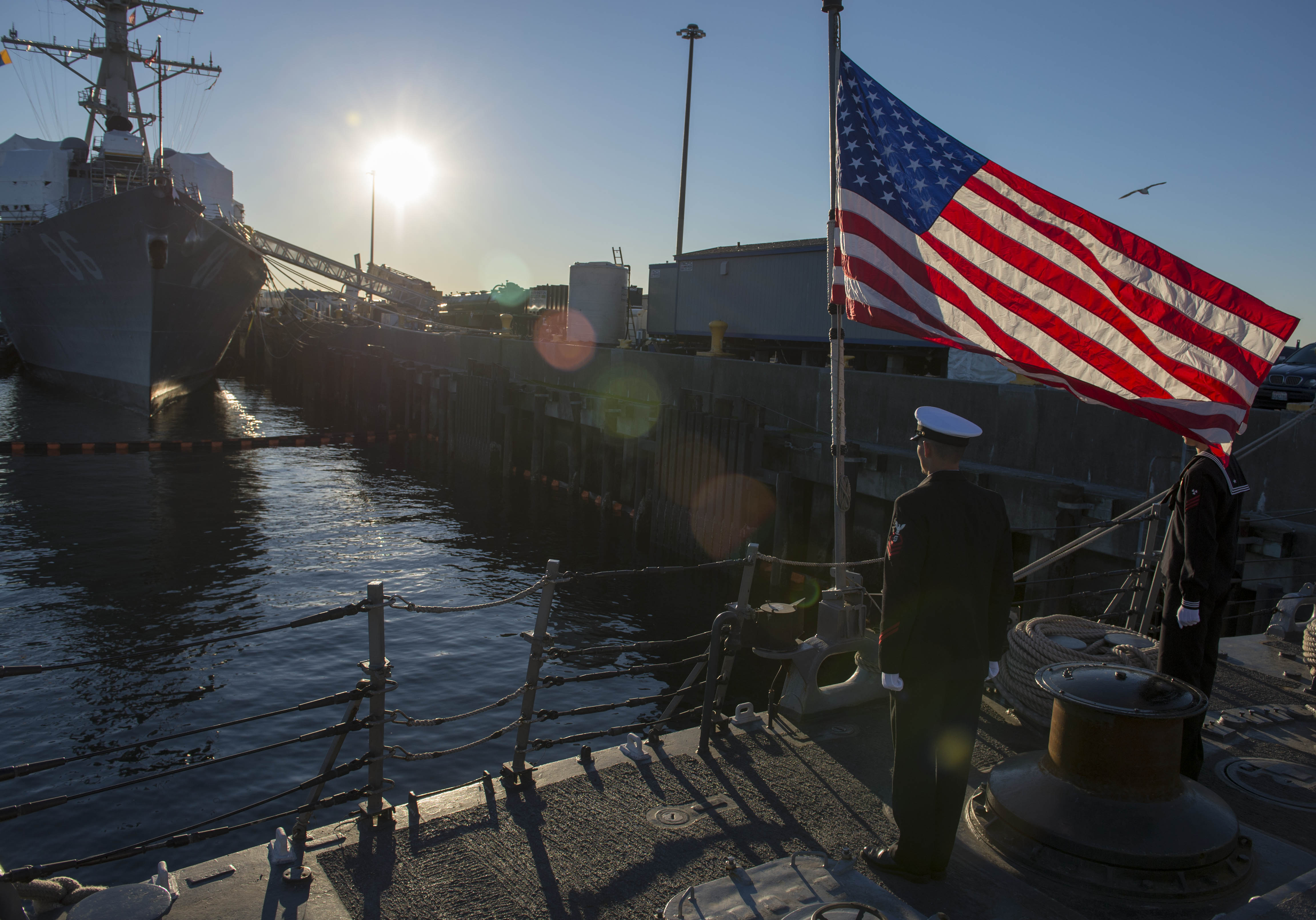 EVERETT, Wash. (Nov. 12, 2014) Sailors assigned to the Oliver Hazard Perry-class frigate USS Ingraham (FFG 61) prepare to haul down ship's colors during a decommissioning ceremony. Ingraham was decommissioned after 25 years of Naval service. U.S. Navy photo by Mass Communication Specialist 2nd Class Justin A. Johndro.