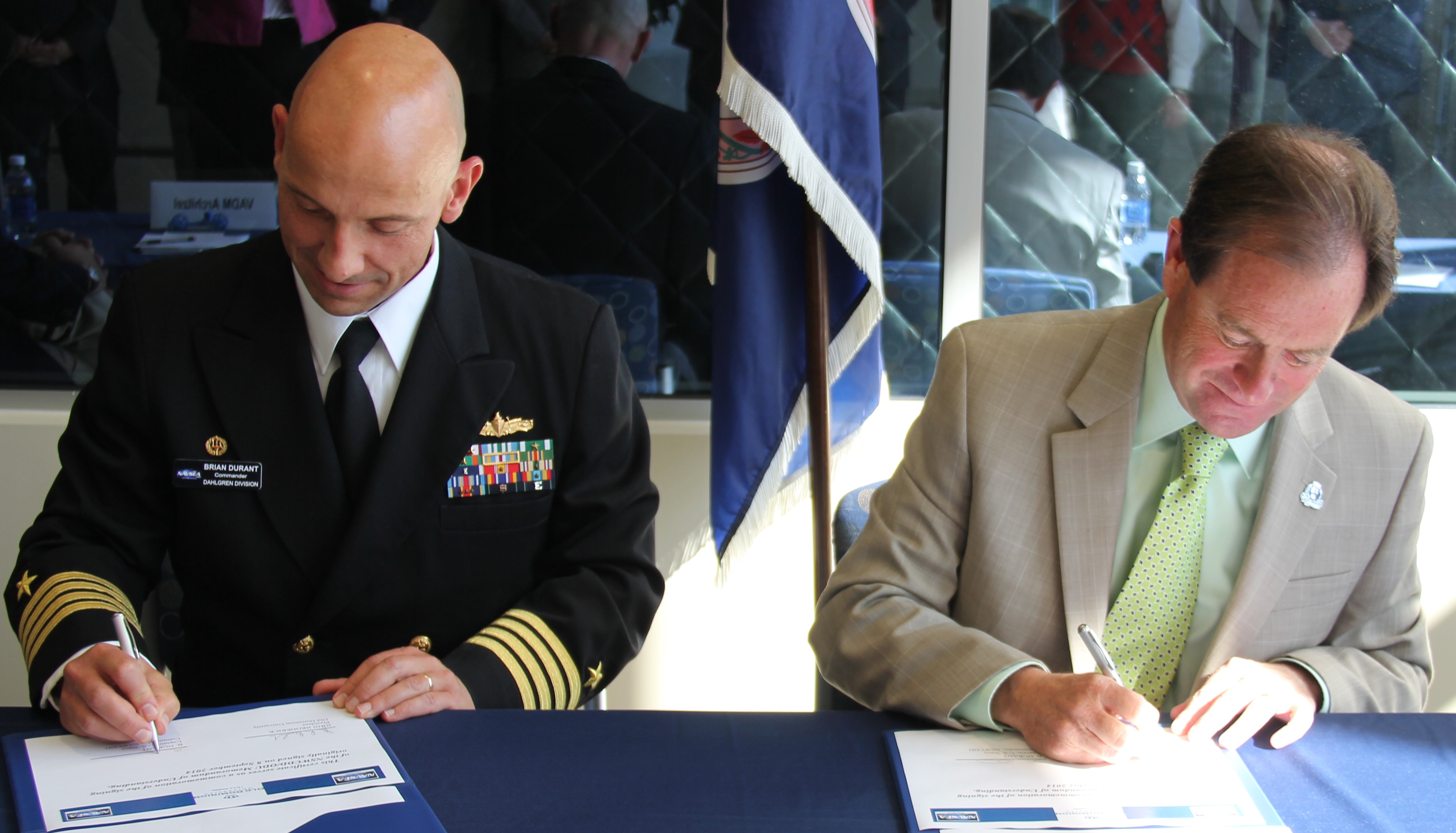 NORFOLK, Va. — Naval Surface Warfare Center Dahlgren Division (NSWCDD) Commander Capt. Brian Durant and Old Dominion University President Dr. John Broderick sign a memorandum of understanding at ODU Oct. 28. In addition to the memorandum of understanding — which defines the engagement field of a maturing NSWCDD-ODU relationship — they signed education partnership and non-disclosure agreements to expand collaboration benefitting Navy technology programs as well as the university's students and faculty.