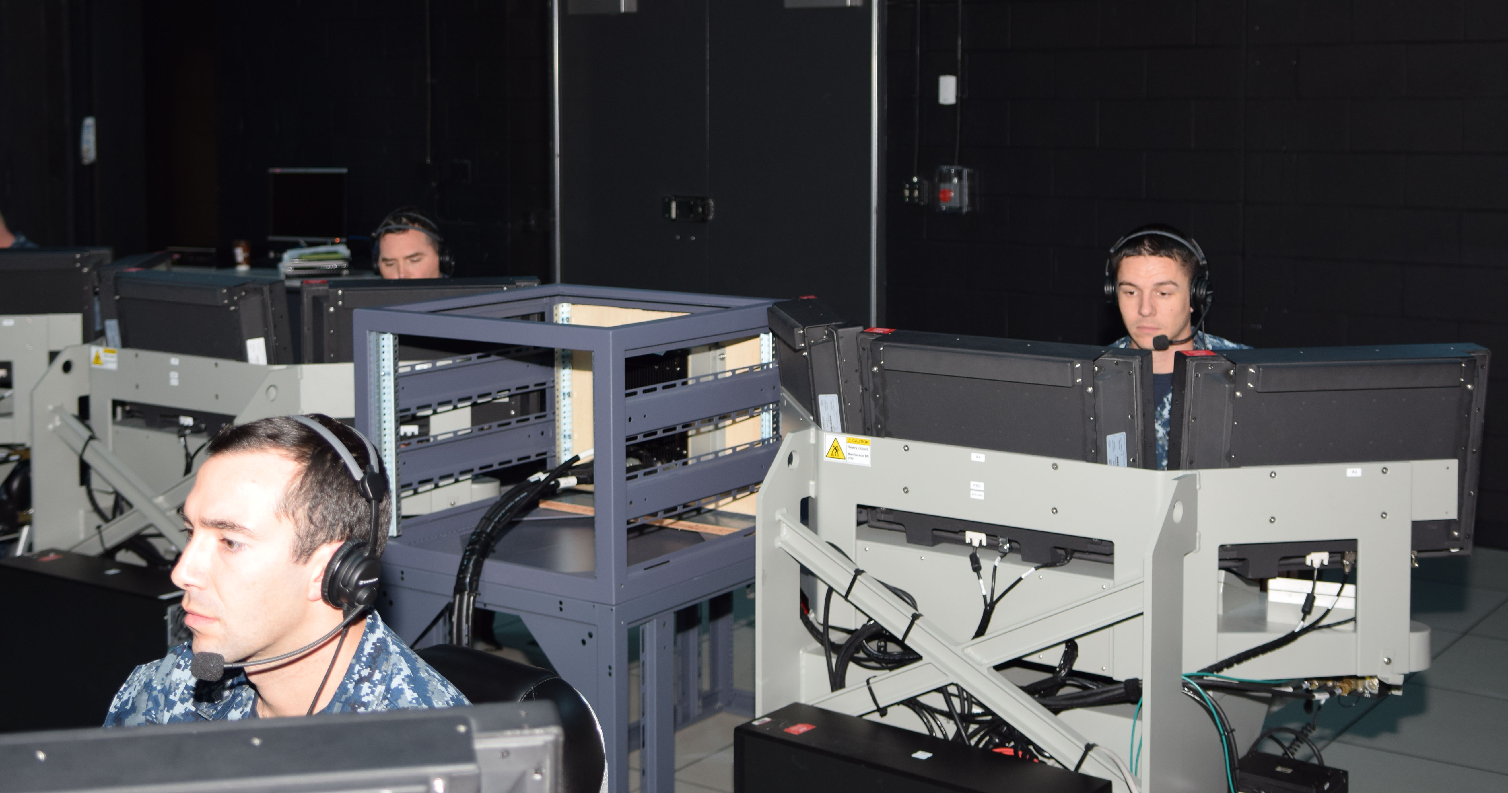 VIRGINIA BEACH, Va. (January 22, 2015) During a team training exercise at the Aegis Ashore Team Trainer (AATT), AATT pilot students work at the consoles to gain experience working with the system and to certify for operations prior to deployment. U.S. Navy photo by Fire Controlman 2nd Class Cory Munsterman, Center for Surface Combat Systems Unit Dam Neck.