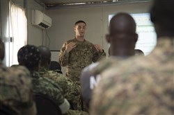 U.S. Army Staff Sgt. Matthew Glaberman, Charlie Company, 411th Civil Affairs Battalion operations sergeant, talks about the effects combat stress can have on a person in a deployed environment, and how to recognize and treat it during a mental health sharing of best practices Oct. 10, 2016, in Mogadishu, Somalia. More than 40 members of the Uganda People’s Defense Force attended the class to learn about combat stress while they are deployed in support of the African Union Mission to Somalia. (U.S. Air Force photo by Staff Sgt. Eric Summers Jr./Released)