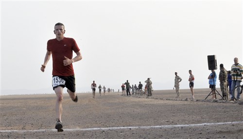 GRAND BARA DESERT, Djibouti (Dec. 16, 2010)  U.S. Army Staff Sergeant Nathan O&#39;Donnell crosses the finish line at the 28th Annual Grand Bara 15k Race, sponsored by the French Foreign Legion, December 16, in the Grand Bara Desert of Djibouti.  More than 300 members attached to Combined Joint Task Force - Horn of Africa and Camp Lemonnier participated in the race.  SSG O&#39;Donnell was the first member of CJTF-HOA to finish the race.