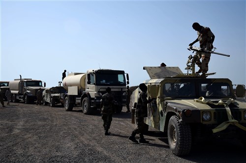 CAMP CHEIK OSMAN, Djibouti – Djiboutian Armed Forces (FAD) Soldiers prepare their convoy for the final test after completing a five-month training course instructed by the U.S. Army Regionally Aligned Forces Soldiers, May 16, 2016, at Camp Cheik Osman, Djibouti. The three-phased training was completed demonstrating their reactions to various mock situations from convoying through a road block, identifying mock roadside bombs, medical care, and vehicle recovery. (U.S. Air Force photo by Staff Sgt. Tiffany DeNault/Released)