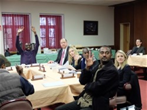 AU journalists engage with AFRICOM during a media delegation visit, Feb. 9, 2015, at Kelley Barracks, U.S. Army Garrison, Stuttgart, Germany.  Eight journalists, who are accredited with the African Union, are here as participants of a U.S. AFRICOM-sponsored media delegation visit to learn about the command's mission and programs. (Photo by Brenda Law/U.S. Africa Command Public Affairs/Released)