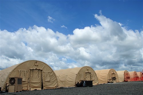 The Monrovia Medical Unit, an Ebola treatment unit built specifically for the care of medical workers who become infected with the virus, sits about 30 miles outside the capital city of Liberia, Nov. 4, 2014. The 25-bed facility was constructed from the ground up by a team of Navy Seabees, Soldiers and Airmen from Joint Forces Command – United Assistance and will be operated by personnel from the U.S. Public Health Service, said Lt. Col. Lee Hicks, the Joint Forces Command – United Assistance command engineer. (U.S. Army photo by Sgt. 1st Class Nathan Hoskins, Joint Forces Command – United Assistance Public Affairs/RELEASED)