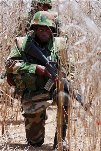 A Senegalese soldier provides security during a squad-level exercise July 13, 2016 in Thies, Senegal as part of Africa Readiness Training 2016. ART 2016 is a U.S. Army Africa exercise designed to increase U.S. and Senegalese readiness and partnership through combined infantry training and live fire events.   (U.S. Army Africa photo by Staff Sgt. Candace Mundt/Released)