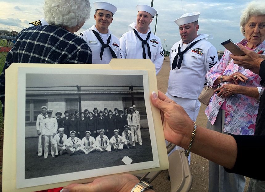 BOSSIER CITY, La. (April 28, 2015) Mary Melson, a former Navy Women Accepted for Volunteer Emergency Service (WAVES), discusses change and shares her experiences with Sailors assigned to the ballistic-missile submarine USS Louisiana (SSBN 743) during the Bossier City, Shreveport Navy Week's Navy Night at Airline High School. Navy Weeks focus a variety of assets, equipment and personnel on a single city for a week-long series of engagements designed to bring America's Navy closer to the people it protects, in cities that don't have a large naval presence. U.S. Navy photo by Mass Communication Specialist 1st Class Chris Fahey.