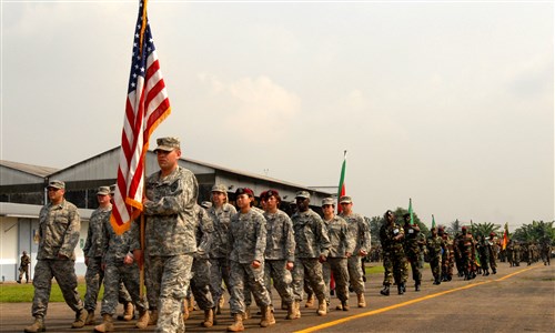 DOUALA, CAMEROON – Staff Sgt. Austin Gordon, Valley City, N.D., 231st Brigade Support Battalion, of the North Dakota Army National Guard leads U.S. service members followed by the five partner nations participating in exercise Central Accord 2013 during the opening ceremony Feb. 20. Cameroon and the U.S. will team up to hone aerial resupply and medical evacuation skills, as neighboring partner nations observe, throughout the 10-day exercise. (Photo by Staff Sgt. Whitney Hughes, 114th PAD, New Hampshire National Guard).