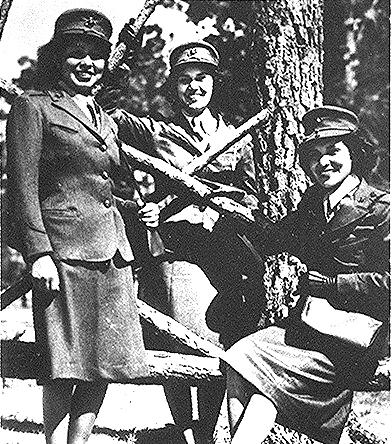 Marine Corps Reservists Minnie Spotted Wolf, Blackfoot, Celia Mix, Potawatomi, and Viola Eastman, Chippewa, pose on Camp Lejeune, N.C. in October 1943. U.S. Marine Corps photo courtesy the National Archives and Records Administration