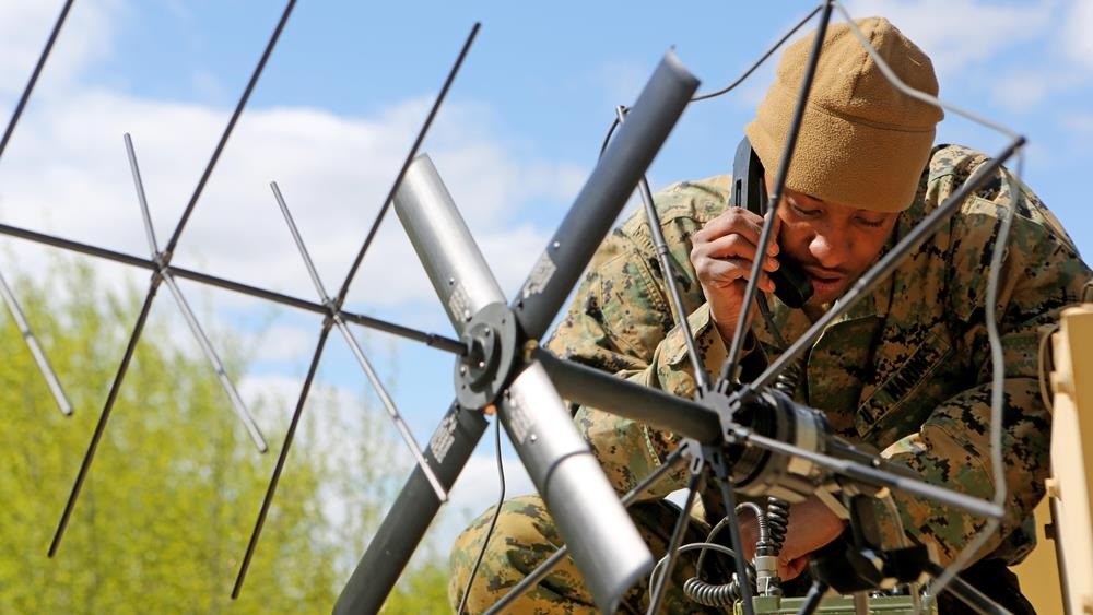CAMP WAINWRIGHT, Alberta, Canada - Sgt. Kentrell Billups, a radio technician with 1st Air Naval Gunfire Liaison Company, tries to establish satellite communications with the division fire support cell during Exercise Maple Resolve 2015 aboard Canadian Manoeuvre Training Center, Camp Wainwright, Alberta, May 9, 2015. The multi-national exercise, conducted annually by the Canadian Army, is a three-week high-readiness validation exercise for Canadian Army elements designated for domestic or international operations. This year, the 1st Canadian Army Division and the 5th Canadian Mechanized Battle Group are being supported by the British 12th Armoured Infantry Brigade, various U.S. Army elements, and for the first time, members of I MEF’s 1st ANGLICO who bring a unique capability to the table.