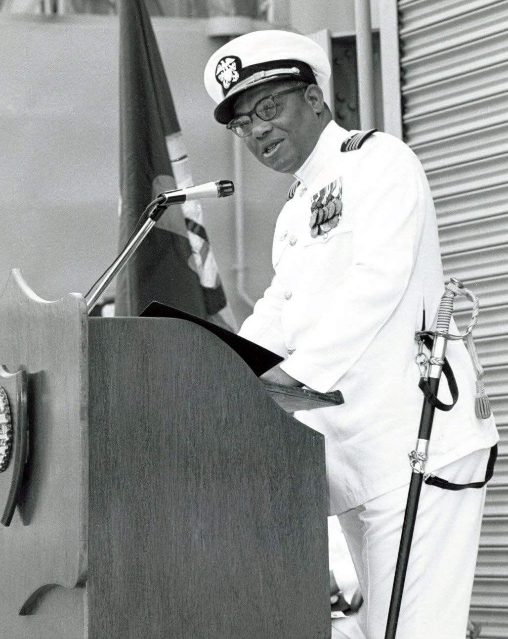 San Diego, Calif. (June 2, 1971) - Official U.S. Navy file photo of Capt. Samuel L. Gravely Jr., speaking at the ceremony marking his promotion to flag rank aboard USS Jouett (DLG 29) at San Diego, Calif. Retired Vice Adm. Gravely passed away on Oct. 22, 2004. He was the first African-American to be selected to the rank of admiral and the first to command a Navy warship. U.S. Navy photo. 