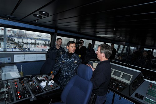 NAPLES, Italy - Vice Admiral Harry B. Harris Jr., deputy commander, U.S. Naval Forces Europe-U.S. Naval Forces Africa/commander of U.S. 6th Fleet, meets with Joseph Sohlberg, ship master of High Speed Vessel Swift (HSV-2), December 28, 2009. Harris was onboard Swift to "kick off" the Africa Partnership Station (APS) mission to East Africa. Swift, along with USS Nicholas (FFG 47), will visit ports in Djibouti, Kenya, Tanzania, Mozambique, Reunion, Mauritius, Seychelles and Comoros. (U.S. Navy photo by Petty Officer 1st Class Gary Keen)