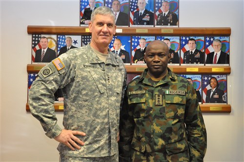 Nigeria Chief of Defence Staff, Gen. Abayomi Olonisakin (right) and the Commander, U.S. Africa Command, Gen. David Rodriguez, pose for a photo.  AFRICOM hosted a two-day meeting that brought together the component commanders and several senior members of the Nigerian military.  The purpose of the visit was to reinforce the importance of a strong US-Nigeria security cooperation relationship, with topics focused on ways to counter terrorism, joint operations, logistics and maritime security in the Gulf of Guinea, Feb. 9, 2016, U.S. Army Garrison Stuttgart, Germany. (Photo by Brenda Law, U.S. Africa Command Public Affairs/RELEASED)