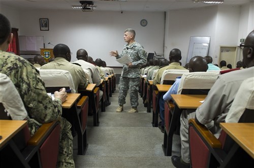 U.S. Army Maj. Gen. Wayne Grigsby Jr., Combined Joint Task Force-Horn of Africa commanding general, speaks to officers Aug. 21, 2014, at the Uganda Senior Command and Staff College in Kimaka, Uganda. Grigsby met and spoke with military officers from several different countries including, but not limited to, Uganda, Kenya, Burundi, Rwanda and Tanzania about what it means to be a leader, a teammate and competent in their craft. (U.S. Air Force photo by Senior Airman Riley Johnson)