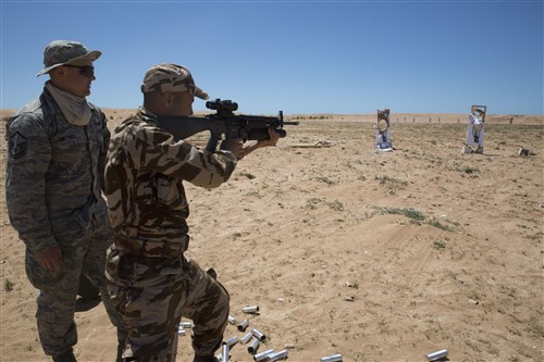 Service members from the Royal Moroccan Armed Forces practice firing the M203 grenade launcher during Exercise African Lion 16, April 19, 2016 aboard the Tifnit Military Base in Morocco. African Lion is an annually-scheduled, combined U.S.-Moroccan exercise designed to improve interoperability and mutual understanding of each nation’s tactics, techniques and procedures while demonstrating the strong bond between the two nations' militaries.  The exercise is scheduled to run through late April 2016.  (U.S. Marine Corps photo by Lance Cpl. Melissa Martens/Released)