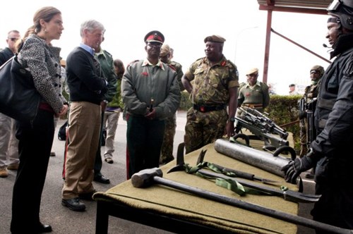 GABORONE, Botswana - U.S. Ambassador to Botswana Michelle D. Gavin, left, and Secretary of the Army John McHugh listen as a Botswana Defense Force soldier discusses equipment used during a capabilities demonstration by Botswana Defence Force soldiers for Exercise Eastern Piper, near Gaborone, Botswana, June 20, 2012. Approximately 100 troops from the U.S Army Special Forces and the BDF participated in the annual exercise program U.S. Africa Command, or U.S. AFRICOM, conducts with partner nations throughout Africa.  (U.S. Army photo by Specialist John G. Martinez)