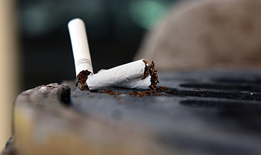 Photo:  Cigarettes in an ash tray.