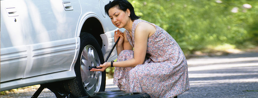 Tire Repair being made by a woman