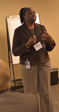 photo of speaker addressing event group